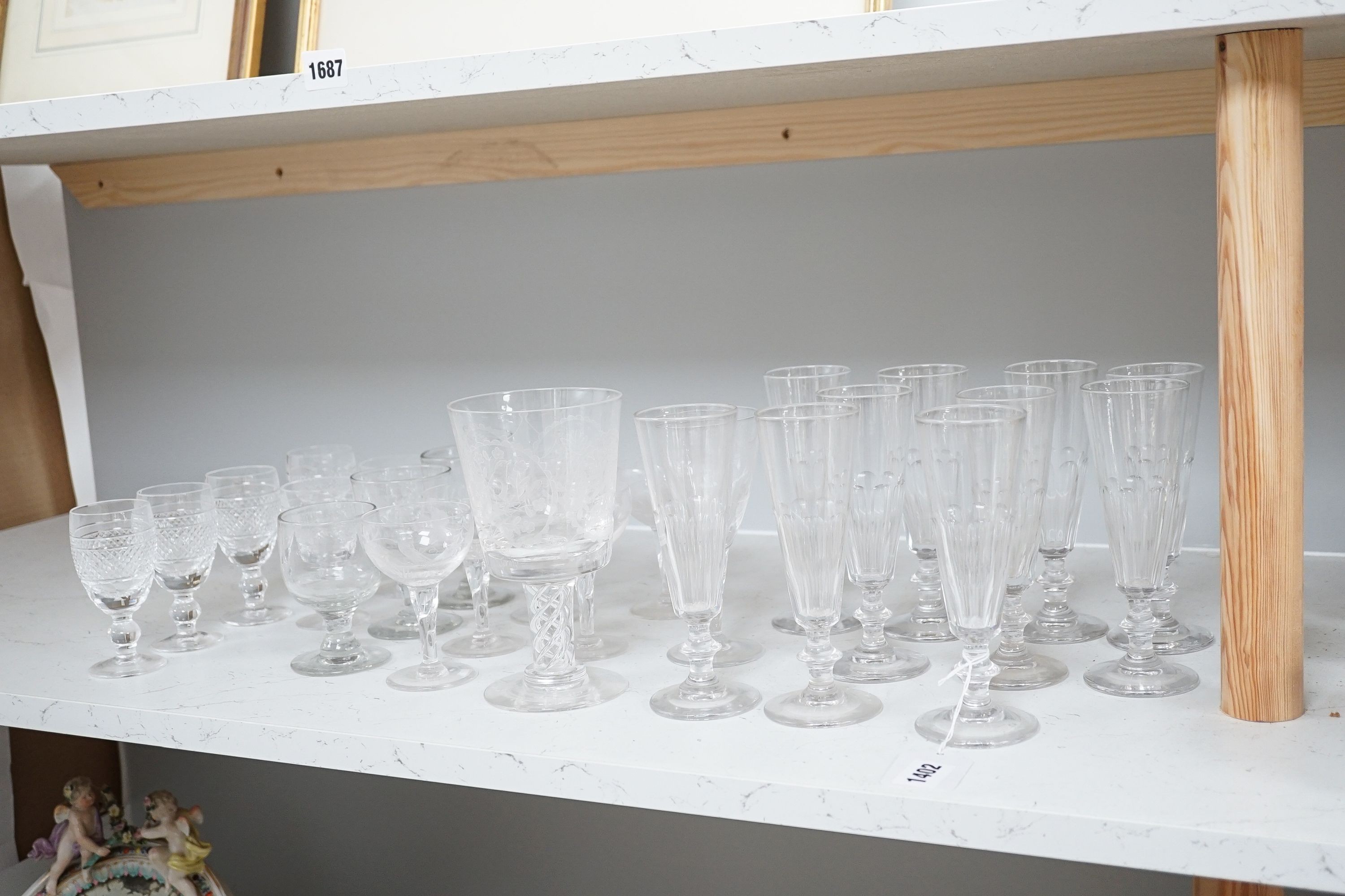 A collection of various suites of 20th century glassware to include a large etched glass